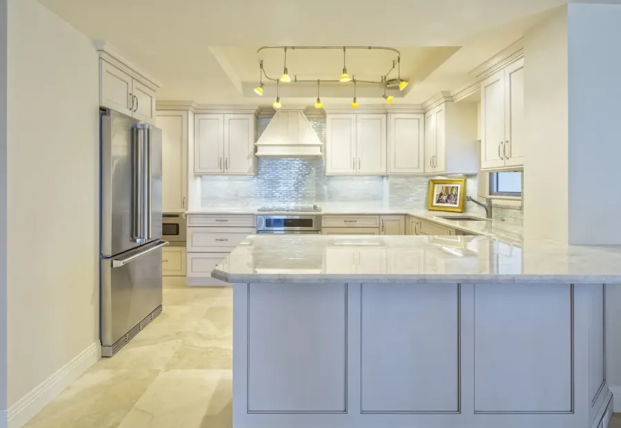 A kitchen with a tiled floor and a tiled backsplash — ceramic tile in New Bedford, MA