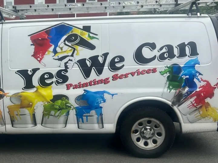 The Yes We Can Painting van, its side covered in the company's paint-splatter artwork, New Bedford, MA
